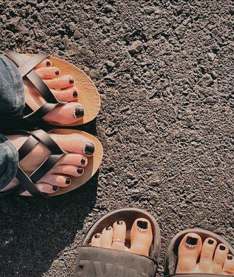 Matching black pedi with rhinestones