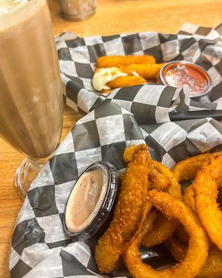 Chocolate milkshake, onion rings and mozzarella sticks.