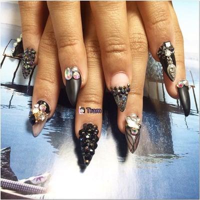 Stiletto!!! Perfect nail shape and designs.