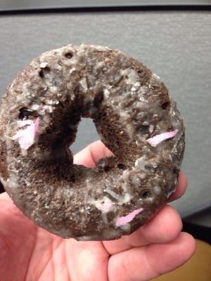 I asked for a vanilla long john... And I got a chocolate glazed with pink paper stuck to it.