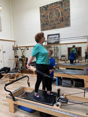 60 plus Pilates Rehab/Fitness client balances on the reformer! So proud!