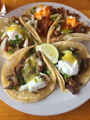 Carnitas, Asada, and pastor tacos.