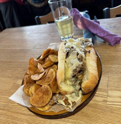 Cheesesteak with provolone and white American cheese.  Yummmm. Also fresh made potato Chips