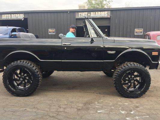 1972 GMC Jimmy lifted with Toyo Open Country MT Tires & Fuel Offroad Wheels