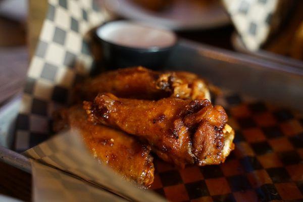 Hot honey wings - not spicy at all, a slight kick but great flavor!