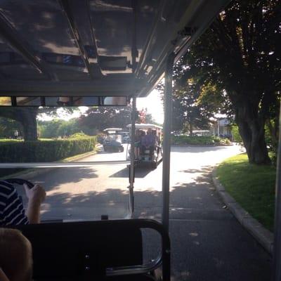 Golf cart ride to the wedding site