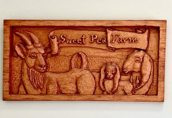 Wood relief with farm logo