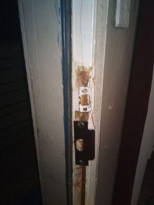 A picture of the door jamb does not securely prevent another break-in requested to fix  nothing! Just rudeness, disrespect, and lies