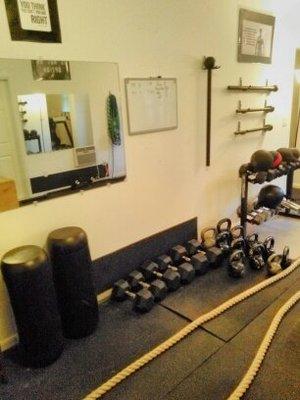 Weighted bags, dumbbells, kettle bells, maces, medicine balls, heavy bags, battling ropes, everything you could need to get in great shape