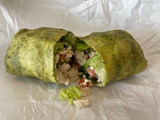 Awesome stuffed Chicken Caesar Wrap on spinach tortilla.