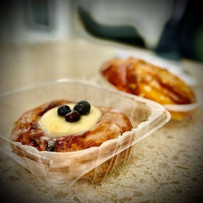 Cream cheese Blueberry Croissant. Background is an Almond brioche.