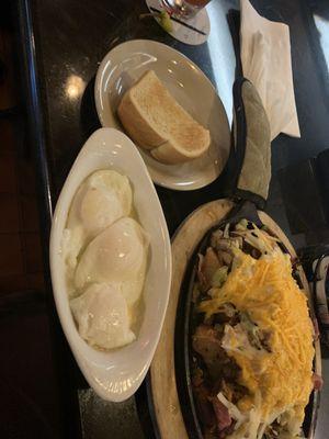 Tsunami Skillet, poached eggs, sourdough toast. The eggs came out perfect.