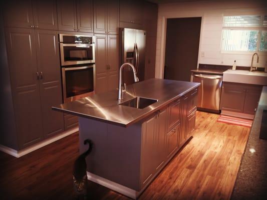 Stainless countertop with custom built-in sink