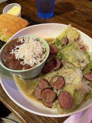 Fried cabbage with andouille, red beans and rice and corn bread.