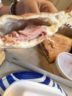 Calzone with ham and bacon and mozzarella.