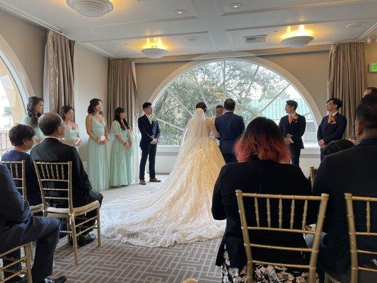 Upstairs ballroom used for ceremony; great natural lighting from the gorgeous arched windows.