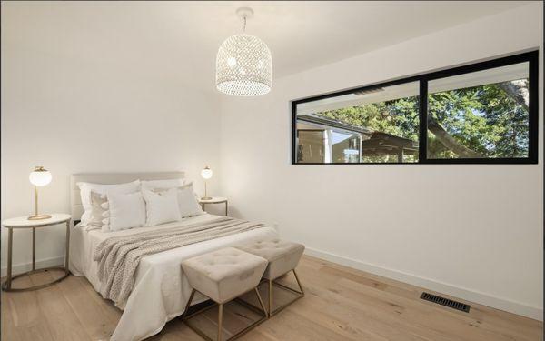 modern bedroom, hardwood floors.