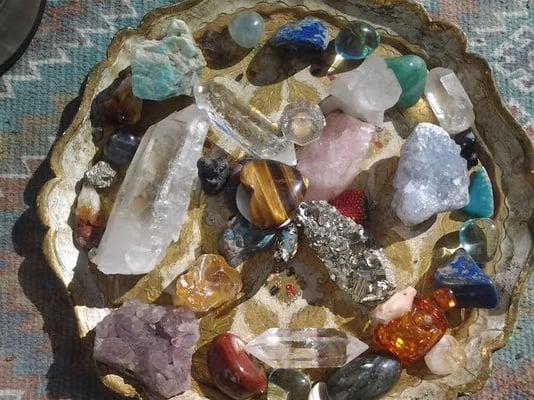 Crystals charging in the sun for a later Reiki session