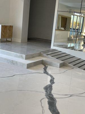 Apoxy floor, tiled steps and ramp, mirror walls, painted walls