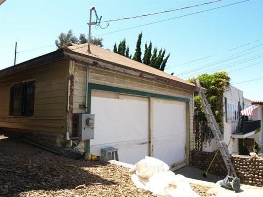 BEFORE photo of a volunteer restoration project for the La Jolla Historical Society.