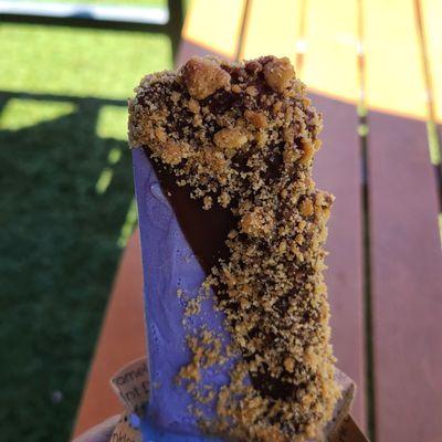 Ube Gelato pop bar with caramel  dark chocolate sauce and Graham cracker