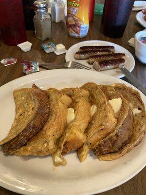 Homemade bread French Toast and locally sourced sausages. Slight hint of cinnamon in egg batter.