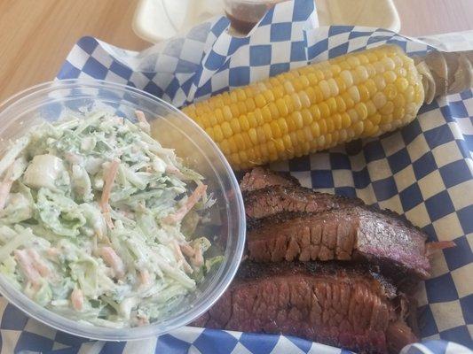 The best brisket ever, tasty corn, and broccoli slaw.