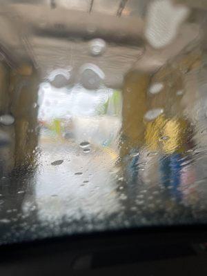 Inside the cleaning tunnel while the guys hand washing my car!