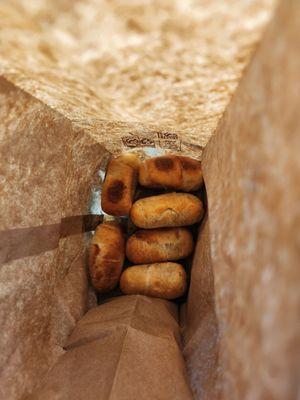 A dozen of the small cream cheese pastelitos