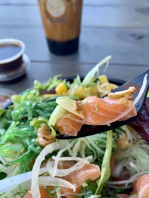 Sitting outside at the Food Hall enjoying Yumi Sushi Yuzu Ponzu Salmon Poke Bowl and a Boba Brûlée Latte