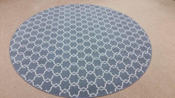 Masland wool carpet cut into a round area rug.