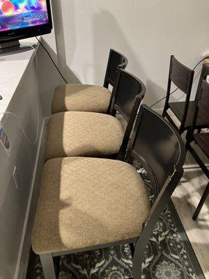 Matches Perfectly!  Three beige padded bar stools transported from the Home Consignment Center