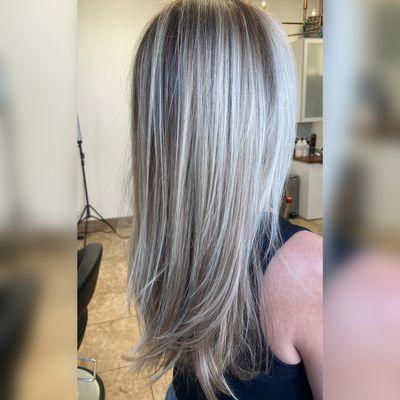 After  
Combo of baby lights with traditional highlights color melting and balayage pieces