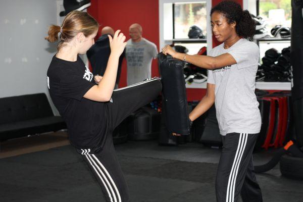 Our Middle/High School Krav Maga classes are challenging and fun for teens!