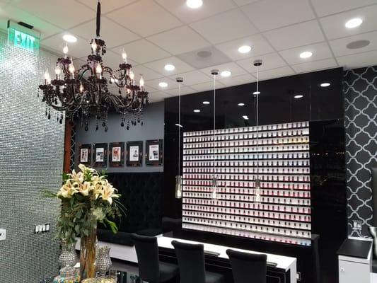 GLO Nail Bar's OPI Polish Wall stands 11 feet high and stretches 8 feet long and displays over 500 colors