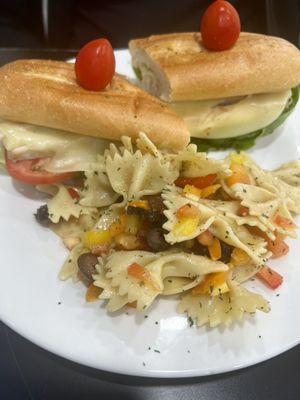 Chicken sandwich with cold pasta salad side