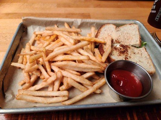 Chicken salad sandwich and fries.