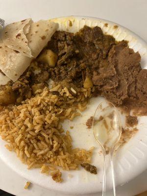 Bistec con papas (steak with potatoes) with rice and beans, comes with 5 homemade tortillas. So good!!! Taste like food from home.