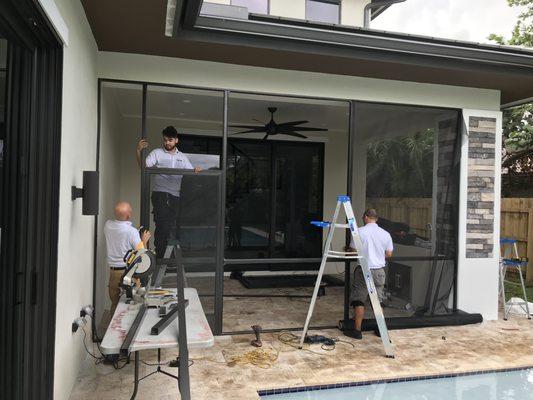 The team building a new porch screen enclosure.