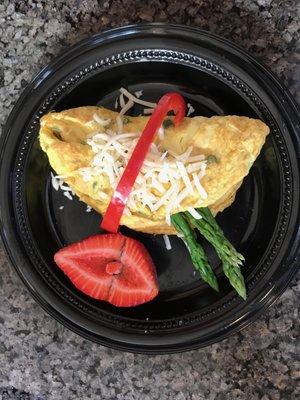 Asparagus and Swiss cheese frittata with fruit.  Only 300 Calories.  And only at the CAST Kitchen