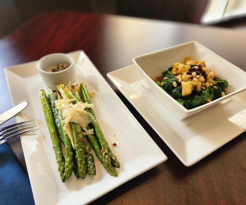 Sauteed asparagus with shaved Parmesan and anchovy butter, and Espinaca Catalan sauteed spinach with pine nuts, apples, raisins, and garlic.