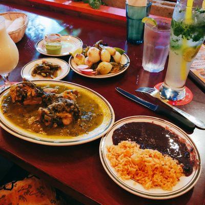 Chicken thighs in green sauce, rice and beans, grilled scallions