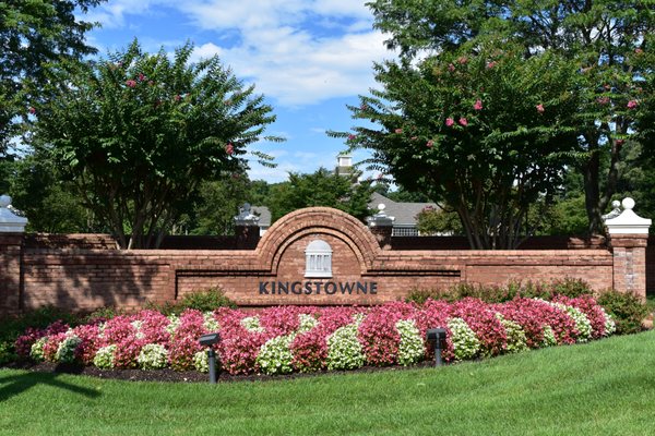 The Kingstowne main entrance with our summer flower rotation.