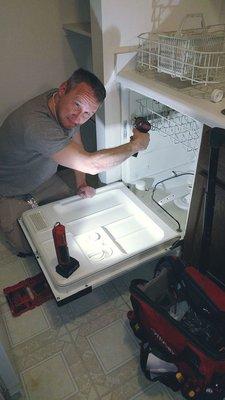 Ivan working on diswasher