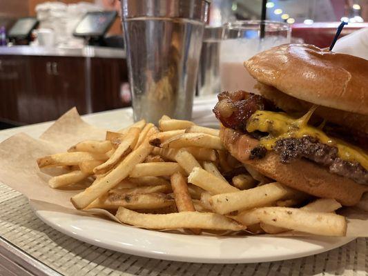 Thin greasy burger with ample fries