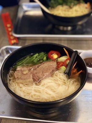 Pho bowl with chicken & pork broth and beef.