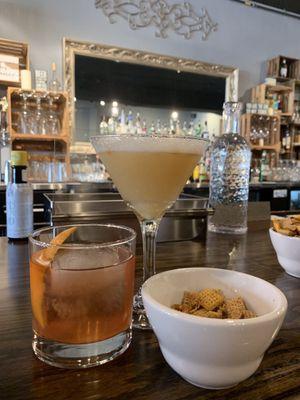 Old Fashioned and Whiskey Sour Proper - and Chex mix. Very simple, pretty bar.