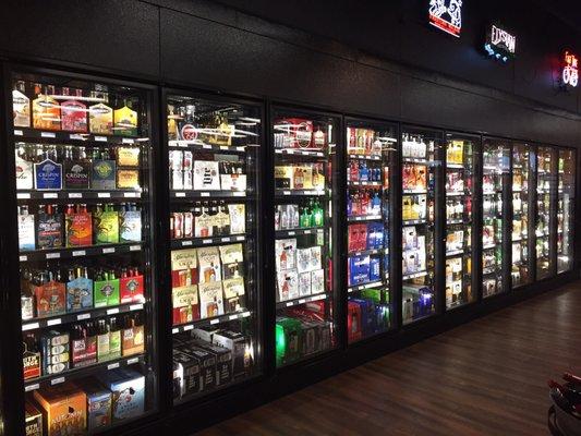 Beautiful, bright, well-lit beer coolers.