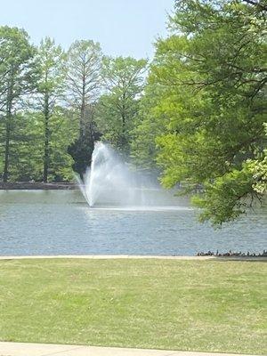 Happy water fountain in the lake