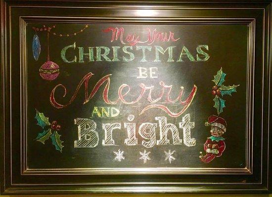 Hanging on the wall in the dining room was a beautifully handwritten (in chalk on a board) Christmas message by a very talented server!